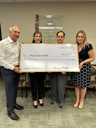 Holy Cross Medical Staff Donates $10,000 To Help Colleagues