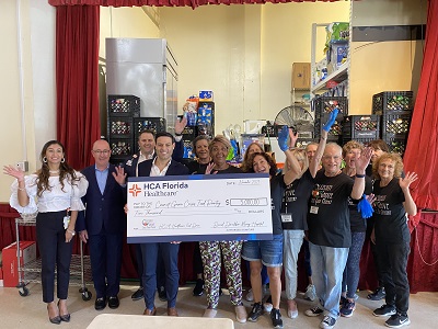 HCA Florida Mercy Hospital donates to Coconut Grove Crisis Food Pantry to help organization provide meals to families who need it the most this Thanksgiving and year-round