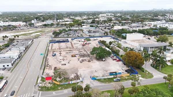 Continuous Flow of Trucks Lined Up for the First Concrete Pour for the New YMCA Family Center and Broward Health Freestanding Emergency Room at Holiday Park